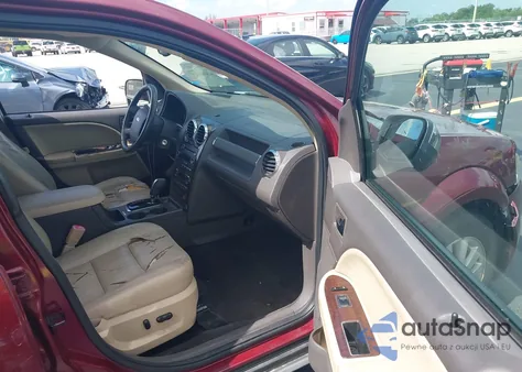 2008 Ford Taurus X Limited z USA, uszkodzony, nr VIN 1FMDK03WX8GA25921